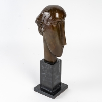 Sculpture en bronze patiné et marbre du XXème siècle
