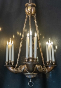 Important lustre en bronze avec faune aux flûtes, XXème siècle