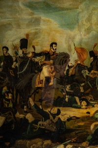 Un fixe sur verre représentant Napoléon et ses troupes sur le champ de bataille
