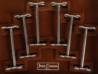 Série de 6 porte-couteaux en métal argenté de la maison Jean Couzon. 1980