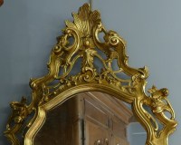 Miroir en bois sculpté doré de style Louis XV 19è siècle