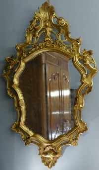Miroir en bois sculpté doré de style Louis XV 19è siècle