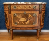 A Commode in Louis XVI Style.