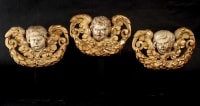 Trois têtes d&#039;ange en bois doré, XVIIIème