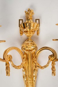 Suite de quatre appliques de style Louis XVI.