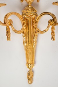 Four Louis XVI style wall-lights .