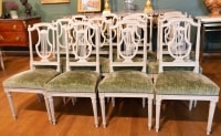 Série de 12 chaises de style Louis XVI. XIXème