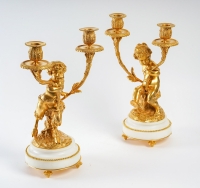 Paire de candélabres de style Louis XVI en bronze doré Un Amour et Un Faune d’après Clodion et Delarue