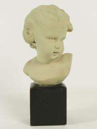 Buste d&#039;enfant en terre cuite, début XXème siècle, signé de GOBET.