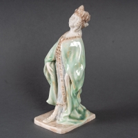 Statuette en porcelaine à couverte émaillée blanc et turquoise, intitulée &quot;Princesse Irène&quot;, signée Mougin, Nancy, début du XXe siècle.