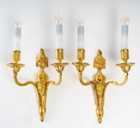 Paire d&#039;appliques à têtes de Bélier en bronze ciselé et doré de style Louis XVI vers 1820