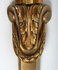 Importante suite de quatre appliques en bronze à trois lumières, style Louis XV, XXème.