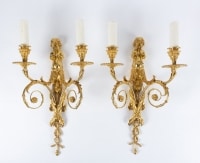 A Pair of Louis XVI style wall lights.