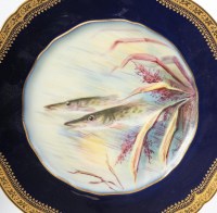 Douze  Assiettes en porcelaine  de Limoges à décors de poissons pour &quot; Emile Bourgeois à Paris &quot;XIXème