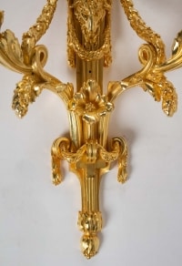 A Louis XVI style pair of wall lights.