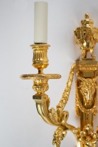 A Louis XVI style pair of wall lights.