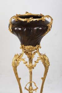 A French 19th Century Guilt and Patinated Bronze Jardinière on Stand.