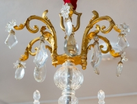 Un lustre en bronze doré à douze bras de lumières fin XIXème siècle