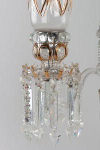 Un ensemble de trois candélabres Baccarat à trois bras de lumière