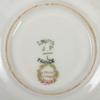 Une suite de tasses en porcelaine Limoges fin XIXème siècle