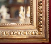 Grand miroir en bois doré, période Napoléon III Style  Louis XVI