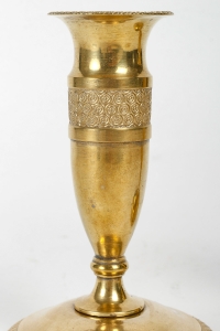 Paire de petits bougeoirs dit « Ragots » en bronze doré époque Empire vers 1815