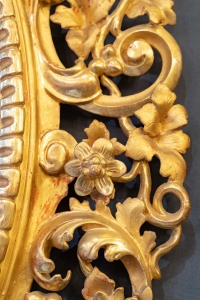 Paire de miroirs en bois sculpté et doré, XIXème siècle, Italie