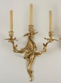 A Set of four wall lights in the Louis XV style, Napoleon III period (1848 - 1870).