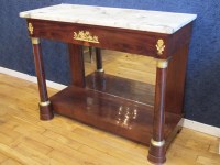 A 1st Empire period (1804 - 1815) console table.