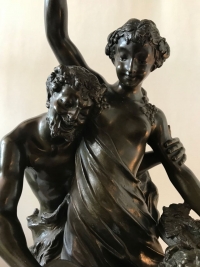 Bronze à patine brune sur socle de marbre griotte, rotatif &quot;L&#039;éducation de Bacchus&quot; par Clodion. Ref: Charles 02.