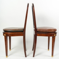 Paire de chaises en marqueterie, bronze doré et galette de cuir, XIXème siècle