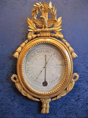 A Louis XVI period (1774 - 1793) barometer-thermometer.