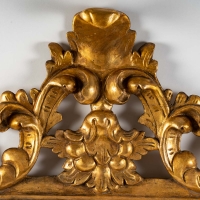 Miroir italien en bois sculpté et doré, XIXème siècle