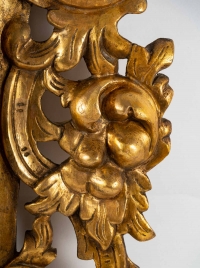 Miroir italien en bois sculpté et doré, XIXème siècle