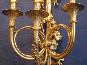 A Pair of Napoleon III period (1848 - 1870) wall lights decorated with hunting horns.