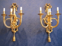 A Pair of Napoleon III period (1848 - 1870) wall lights decorated with hunting horns.