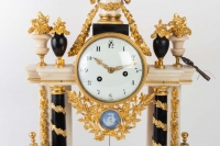 A Louis XVI period (1774 - 1793) portico clock.