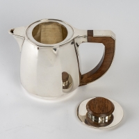 Service à thé et à café à pans coupés argent massif et palissandre de Jean E. PUIFORCAT