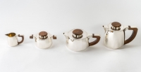 Service à thé et à café à pans coupés argent massif et palissandre de Jean E. PUIFORCAT