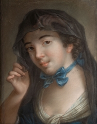 Portrait d&#039;une jeune femme au ruban bleu.