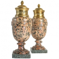 A pair of period Louis XVI rose granite urns with gold gilt bronze. 18th Century. C.1780.