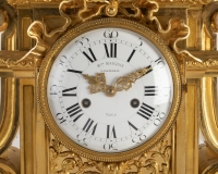A French 19th Century Ormulu Mantel Clock by Maison Marquis.