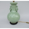 PAIRE DE LAMPES EN PORCELAIN CELADON ET DECOR EN BAS RELIEF | Biron PAIRE DE LAMPES EN PORCELAIN CELADON ET DECOR EN BAS RELIEF