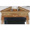 Miroir en bois et stuc doré de forme néoclassique de la fin du XIXème siècle. | Biron Miroir en bois et stuc doré de forme néoclassique de la fin du XIXème siècle.