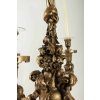 Lustre en bois sculpté et doré du XIXème siècle pour l'utilisation de l'éclairage à la bougie, 4 bras, 4 bougies.