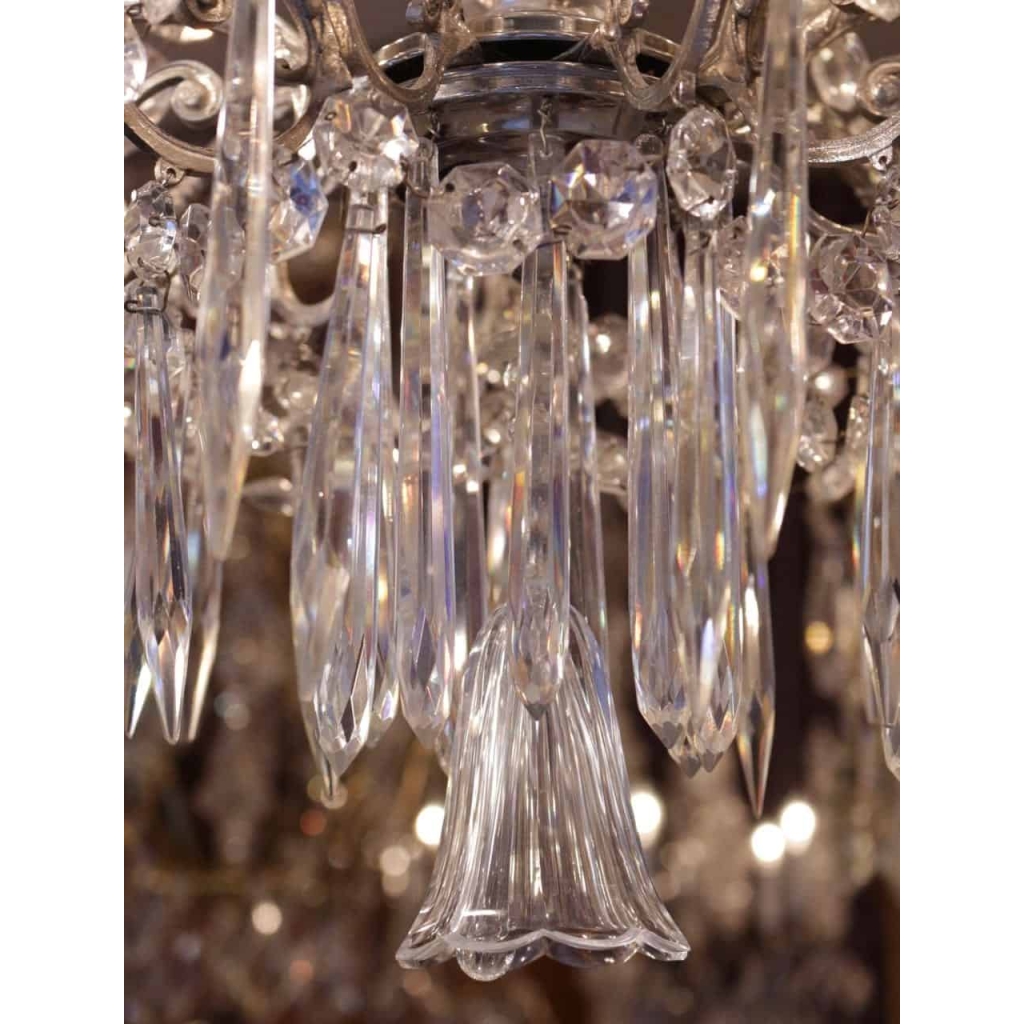 Baccarat - Lustre argenté eclairant par neuf bras de lumiere