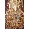 Baccarat – Grand lustre doré à dix huit bras de lumière | Biron Baccarat - Grand lustre doré à dix huit bras de lumière