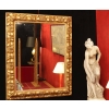 Miroir en bois et stuc doré du XIXème siècle d’époque Napoléon III. | Biron Miroir en bois et stuc doré du XIXème siècle d'époque Napoléon III.
