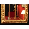 Miroir en bois et stuc doré du XIXème siècle d’époque Napoléon III. | Biron Miroir en bois et stuc doré du XIXème siècle d'époque Napoléon III.