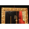 Miroir en bois et stuc doré du XIXème siècle d’époque Napoléon III. | Biron Miroir en bois et stuc doré du XIXème siècle d'époque Napoléon III.